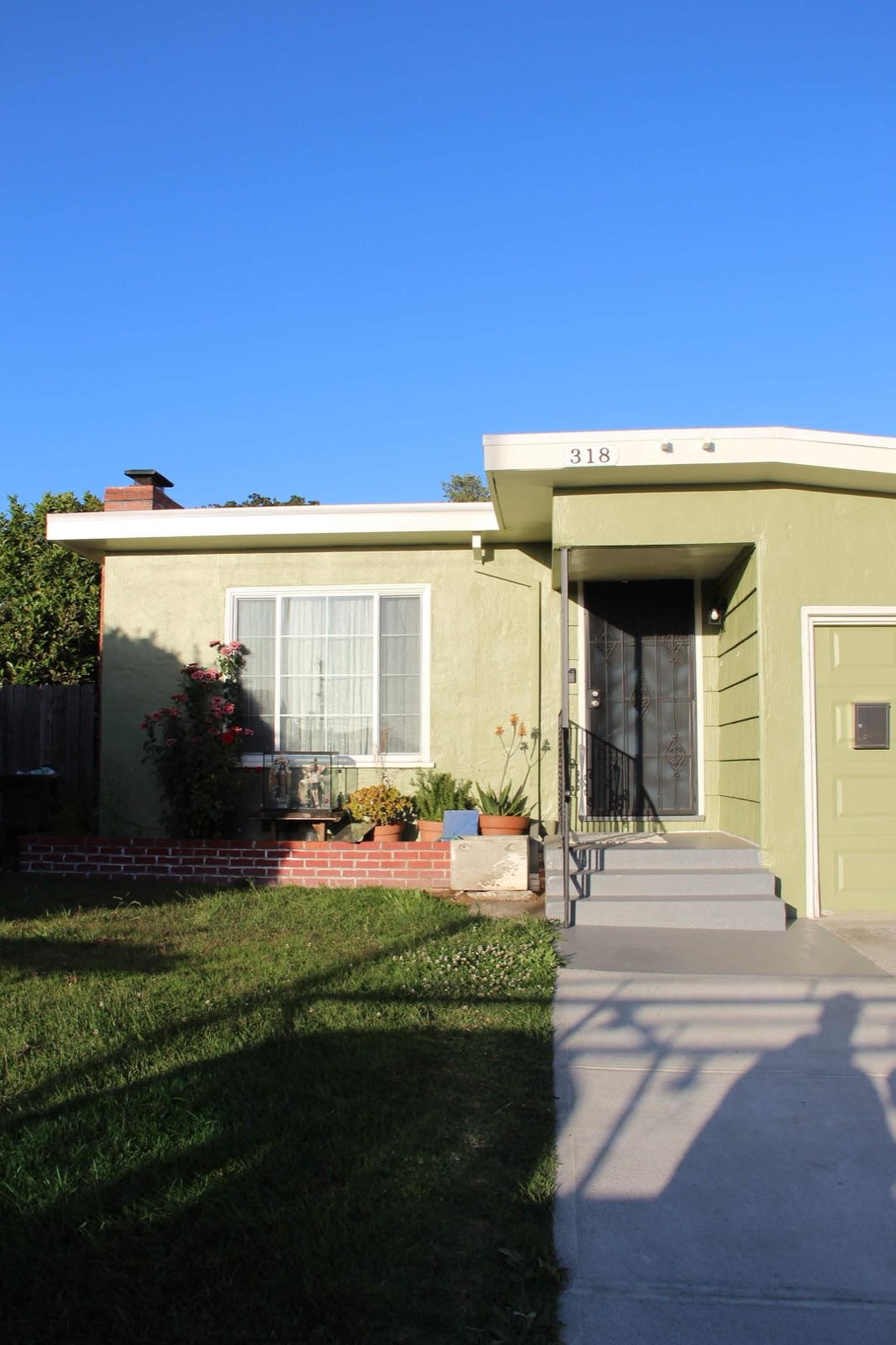 Home exterior after Montes Restoration Painting repaint